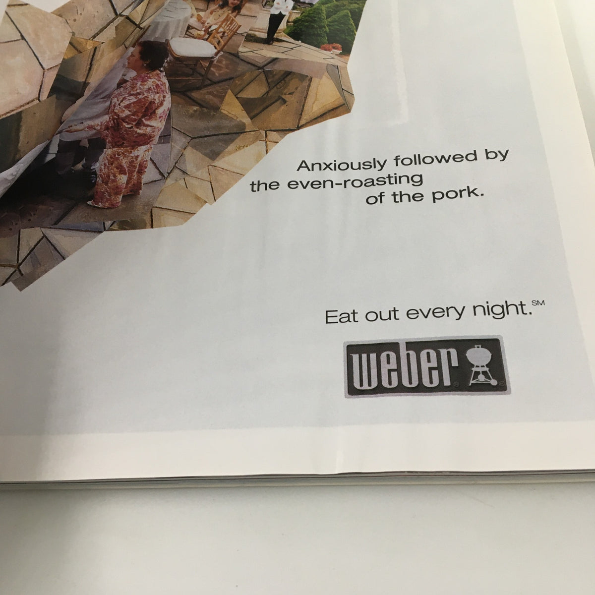 Weber advertisement within Gourmet Magazine April 2001, promoting outdoor cooking with a focus on even-roasting of pork.