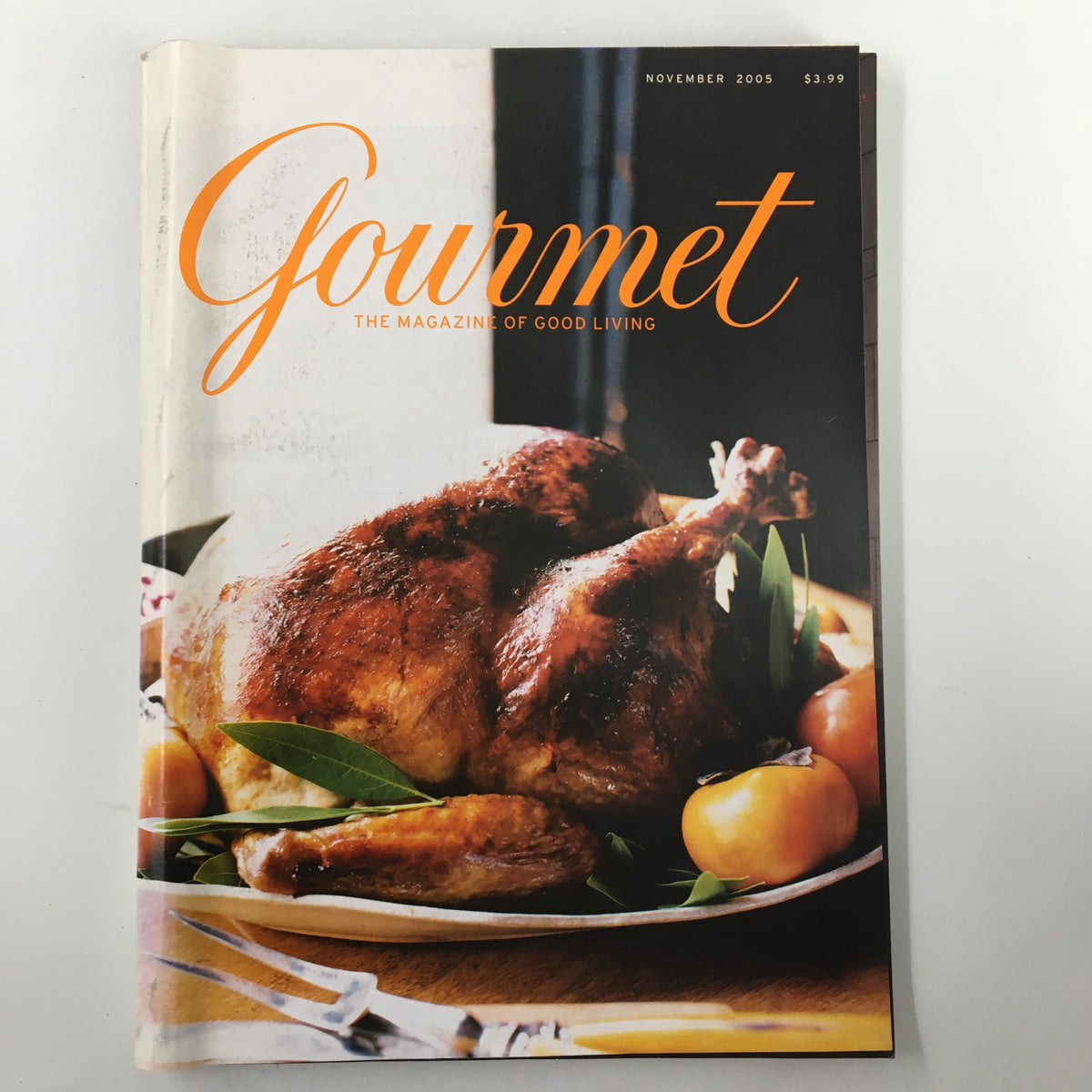 Gourmet Magazine November 2005 featuring a beautifully roasted turkey with garnishes on a plate. This vintage magazine cover showcases the essence of culinary excellence.