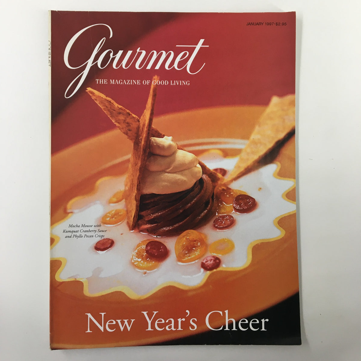 Cover of Gourmet Magazine January 1997 titled 'Dining On The Light Side w/ Steak and Potatoes', featuring a dessert dish with mocha mousse garnished with toppings, themed for New Year’s cheer.