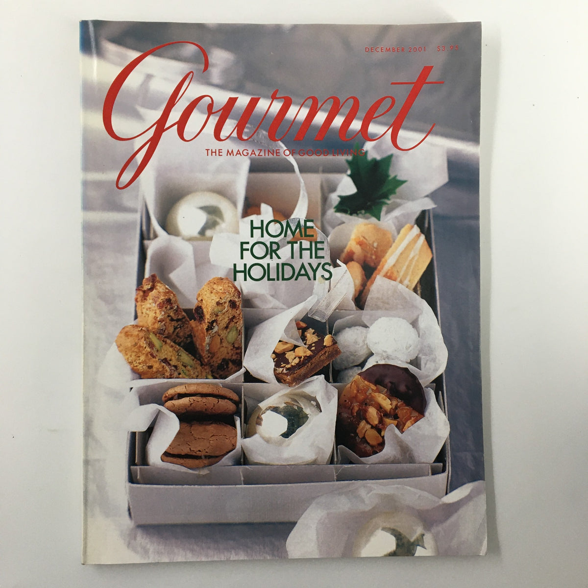 Cover of Gourmet Magazine December 2001, titled 'Home for the Holidays', featuring an assortment of holiday treats including cookies and pastries.