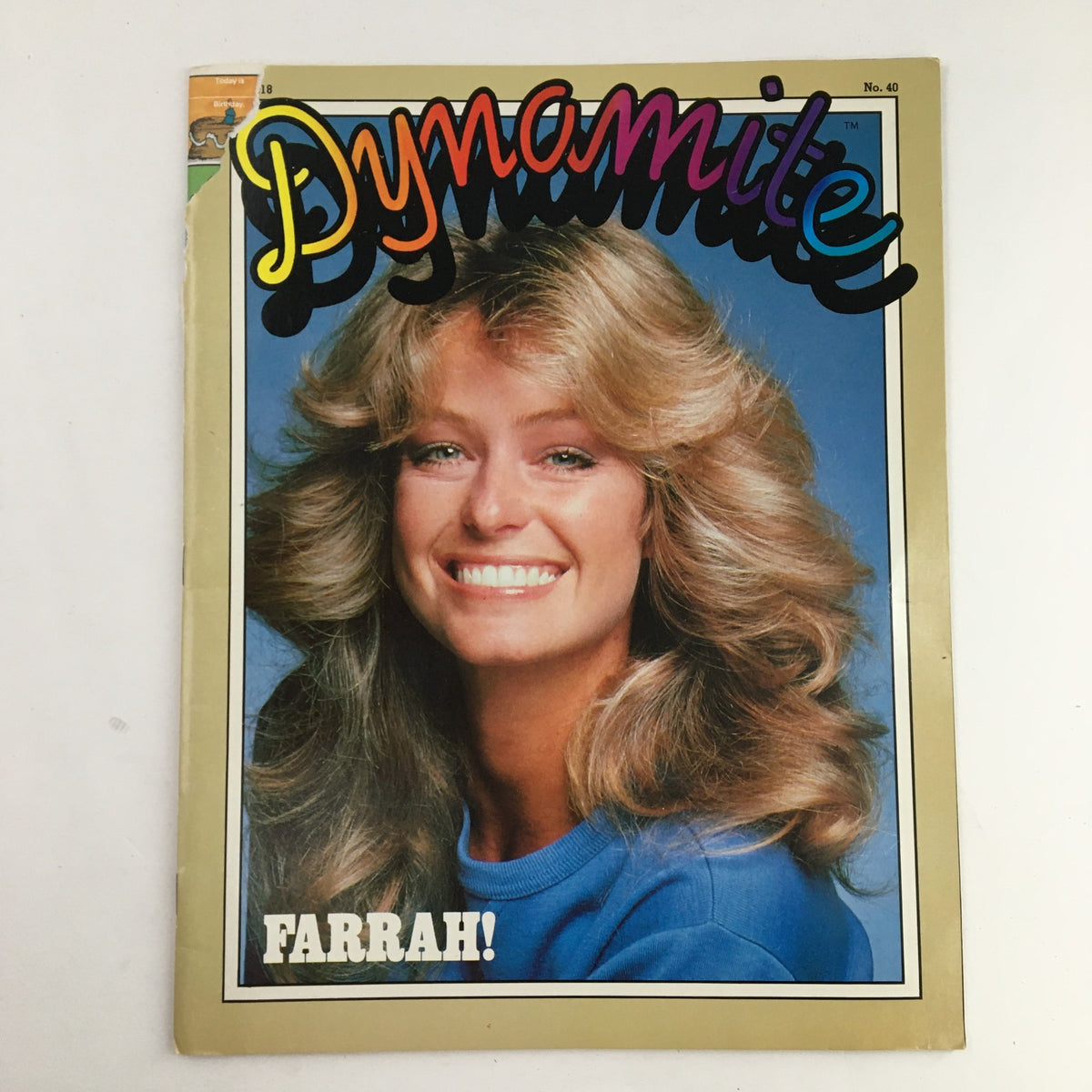 Dynamite Magazine #40 featuring American actress Farrah Fawcett on the cover, showcasing her iconic hairstyle and radiant smile against a colorful background.