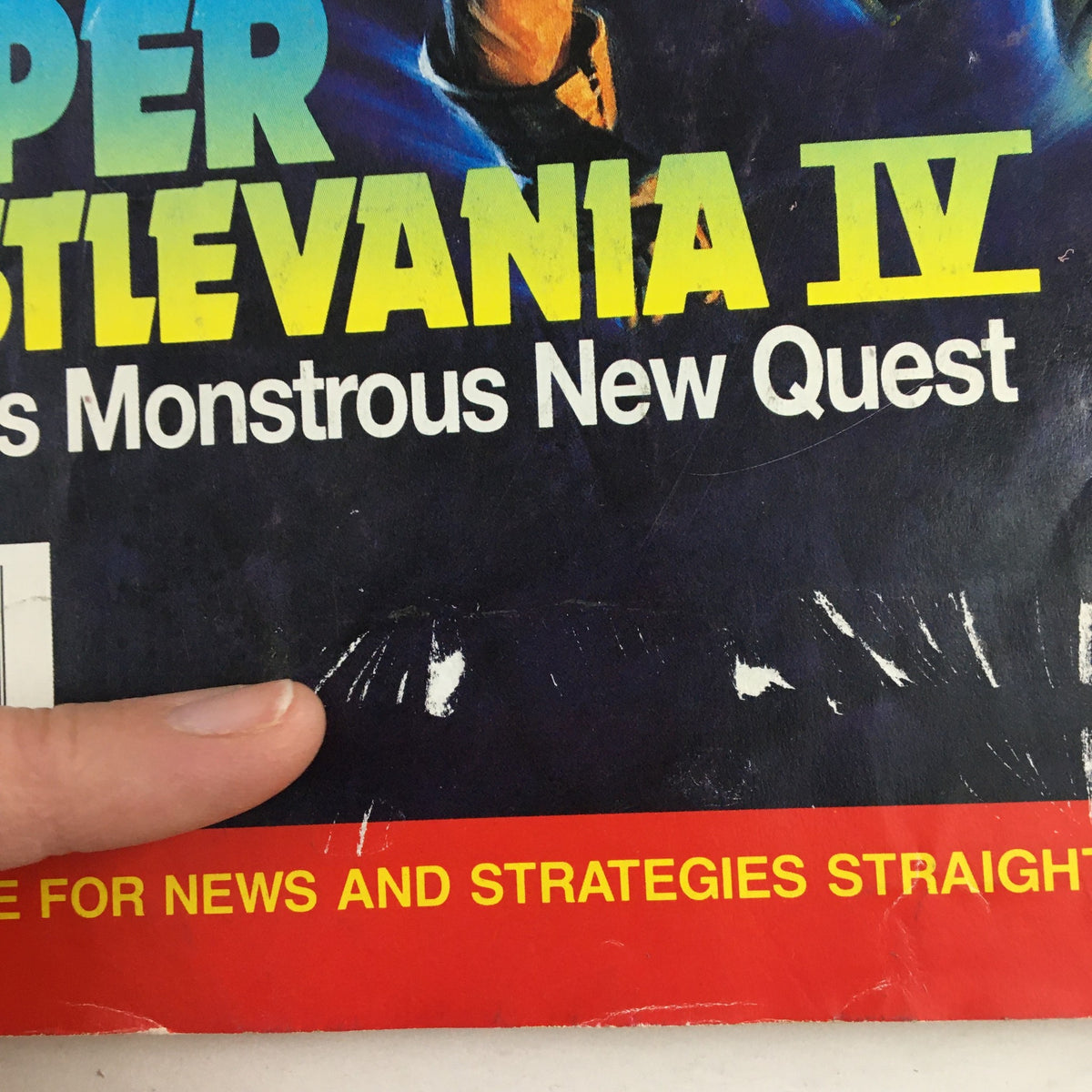 Close-up of the Nintendo Power Magazine January 1992 cover featuring Super Castlevania IV and the subtitle 'Simon's Monstrous New Quest.' The image highlights the magazine's title and minor wear.