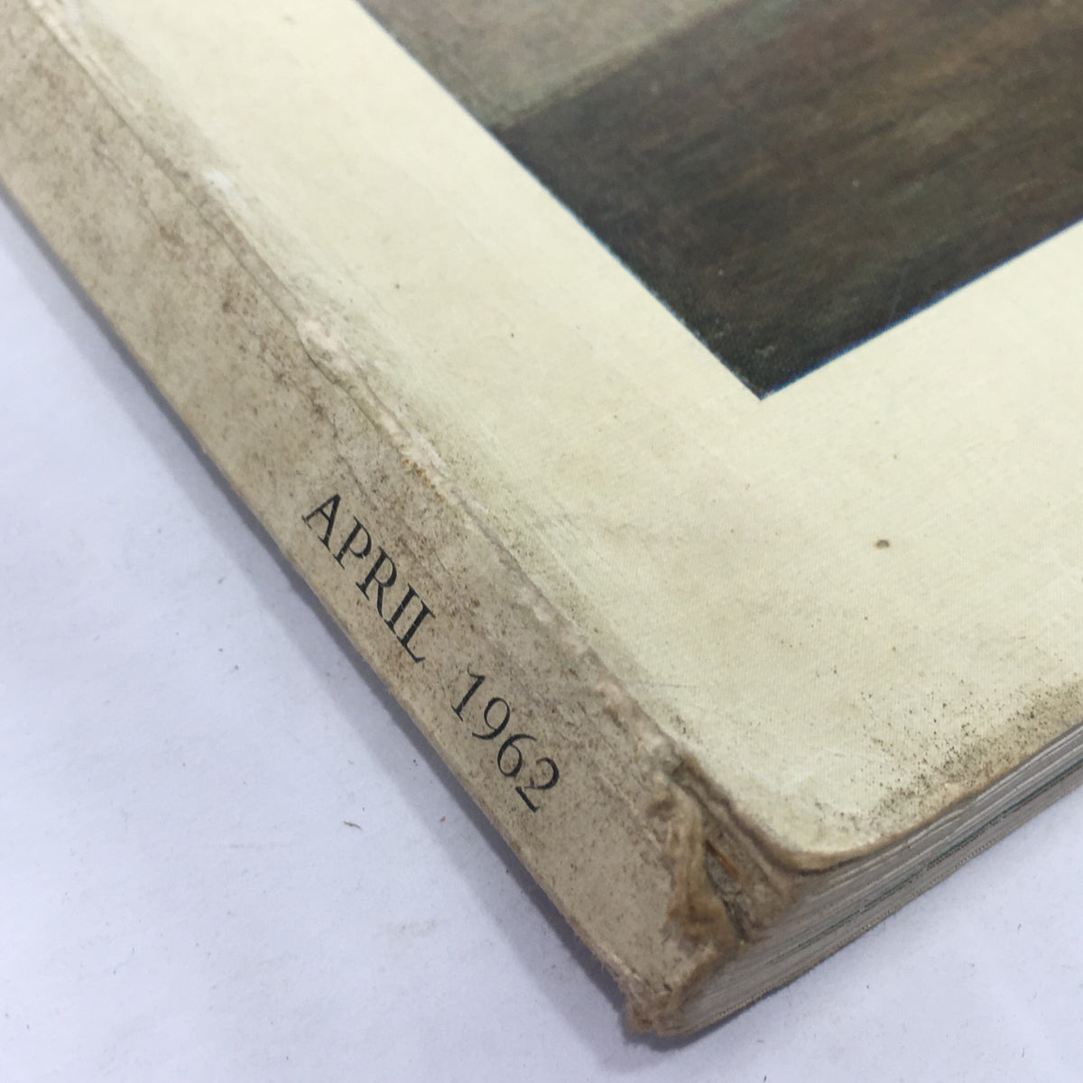 Side view of The Connoisseur magazine, April 1962, highlighting the publication date 'APRIL 1962' printed on the spine.
