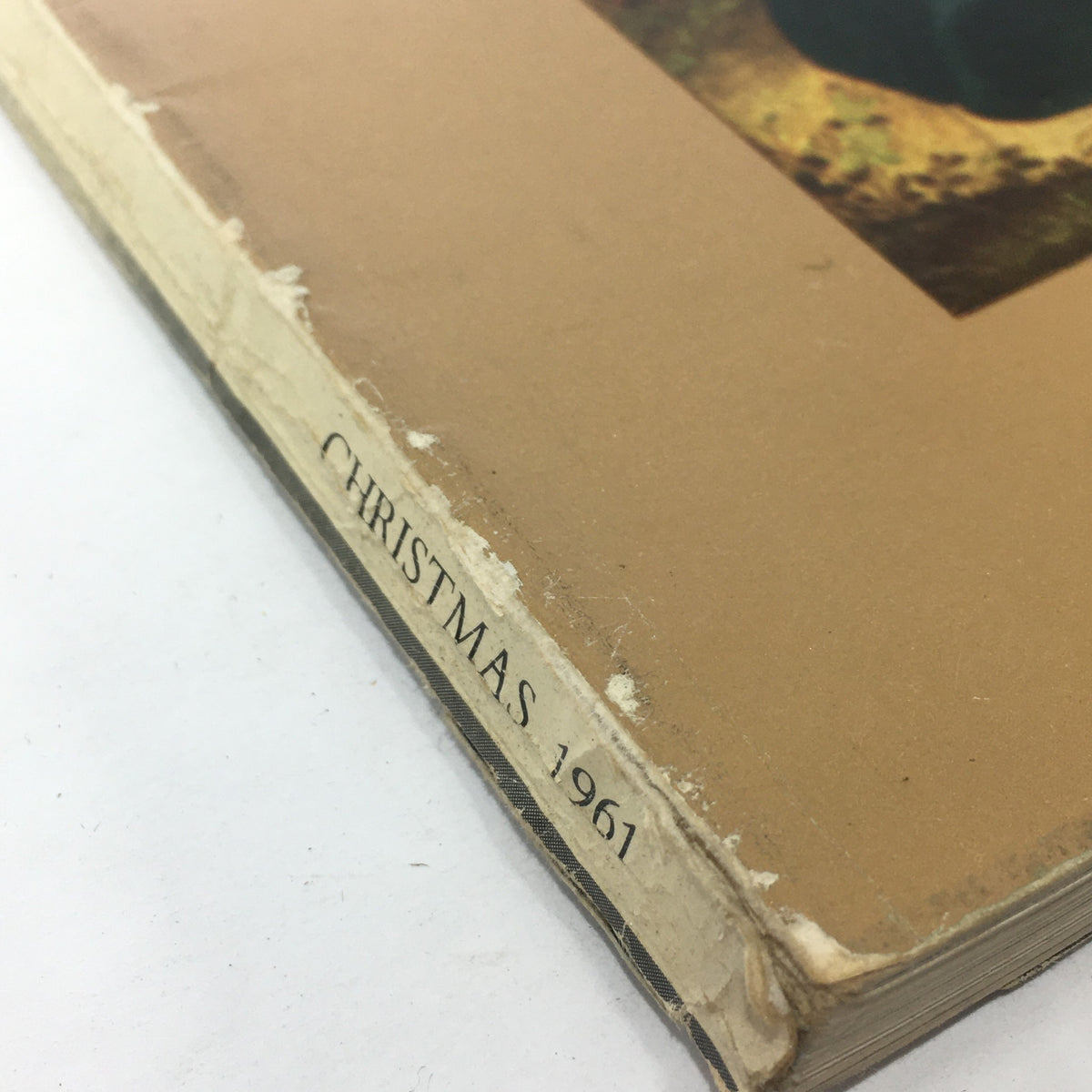 Bottom edge of The Connoisseur Magazine, December 1961, showing the year 'Christmas 1961' printed, emphasizing its holiday edition collectible value.