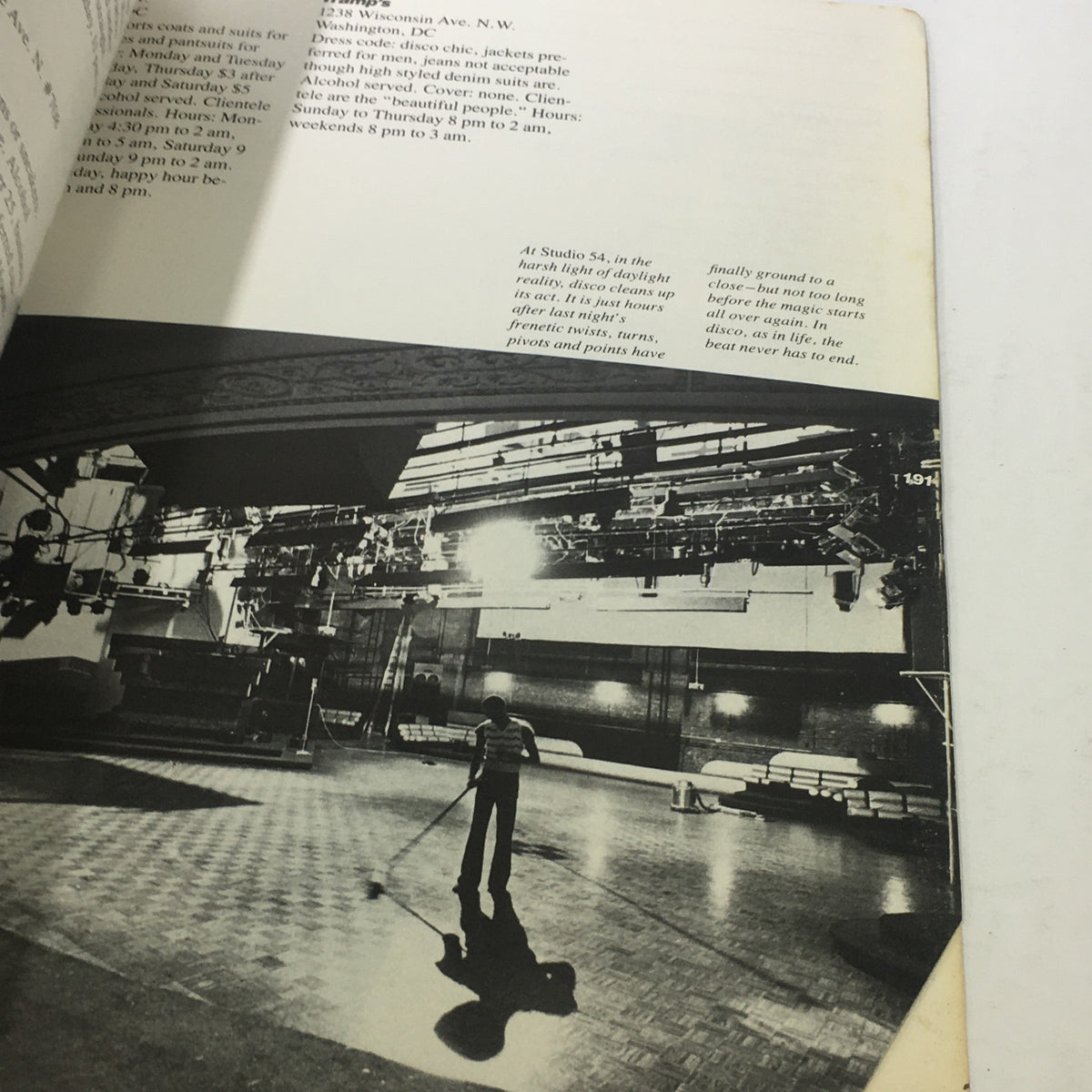Black and white photograph depicting the interior of Studio 54 from VTG Dancing Disco Charts Guide Catalog: 1979 by WGBH Educational Foundation showcasing the disco scene.