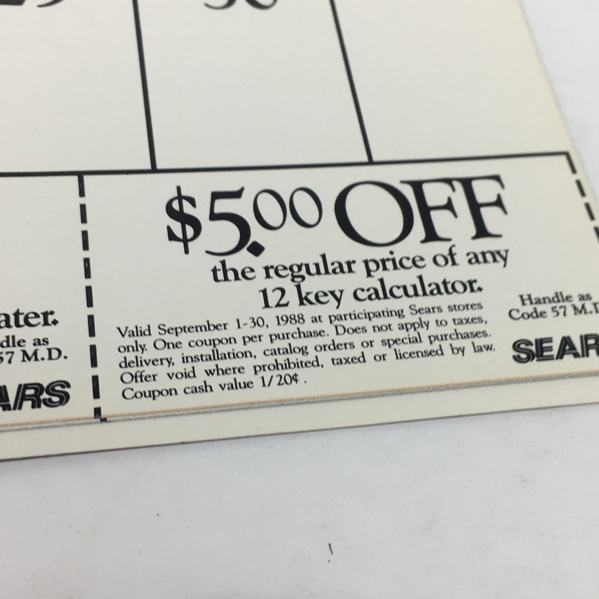 VTG Sears 1988 Classic Calendar Consumer Guide featuring a promotional $5.00 off coupon for calculators, valid at participating Sears stores.