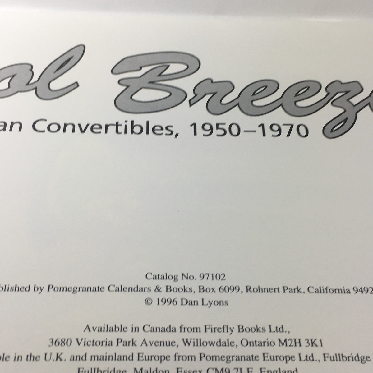Close-up of the publication information in the VTG 1997 Cool Breeze Classic American Convertibles Calendar, highlighting details about availability and the artist Dan Lyons.