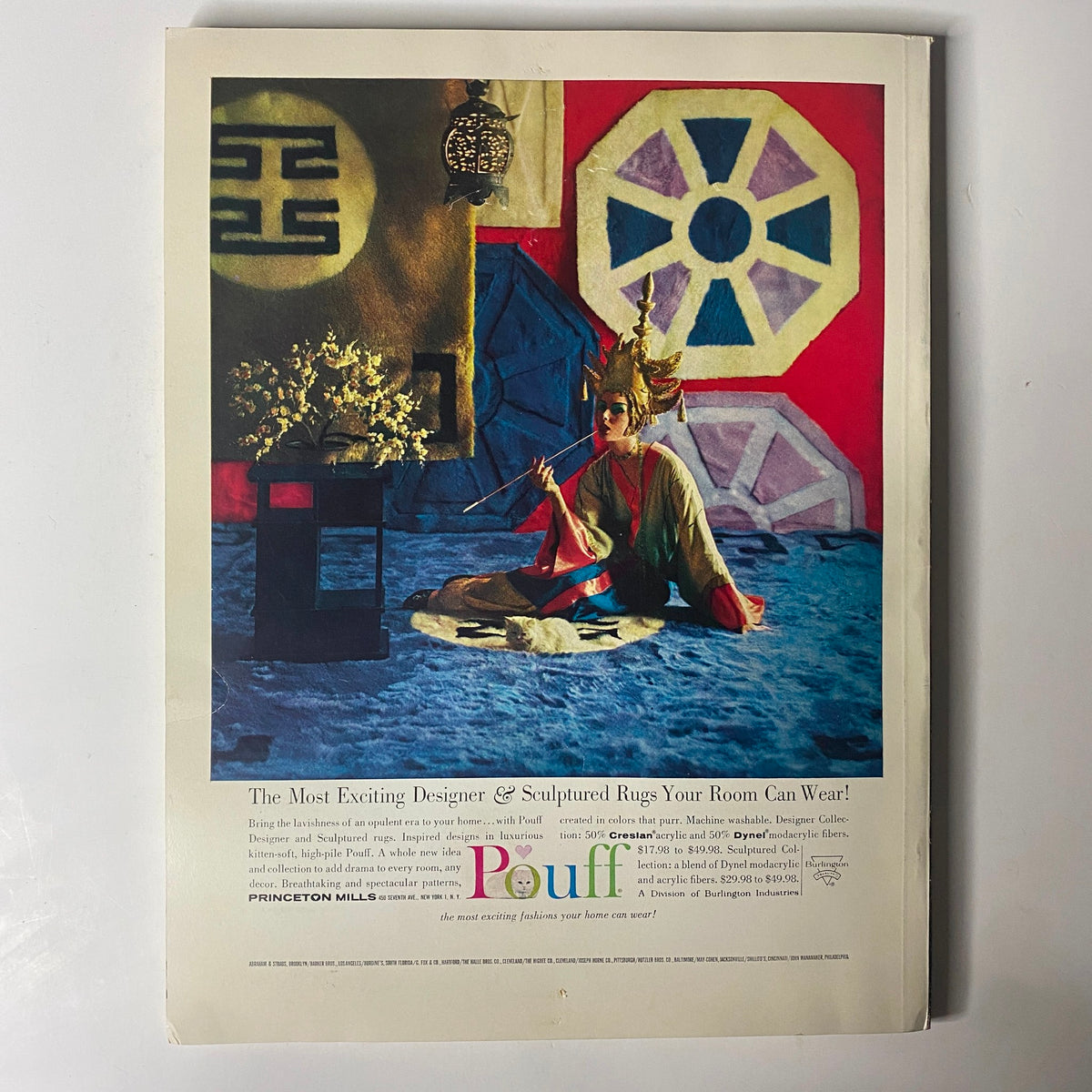 Illustrative advertisement from the 1961 American Fabrics No. 53 Summer Catalog, featuring a model dressed in vibrant designer clothing against a colorful background, promoting sculptured rugs.