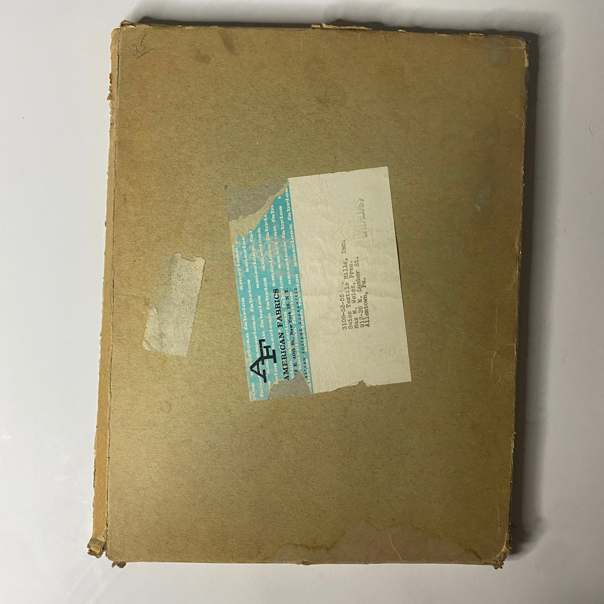 Back cover of the 1961 American Fabrics No. 54 Fall Catalog displaying a shipping label and details typical of vintage textile publications.