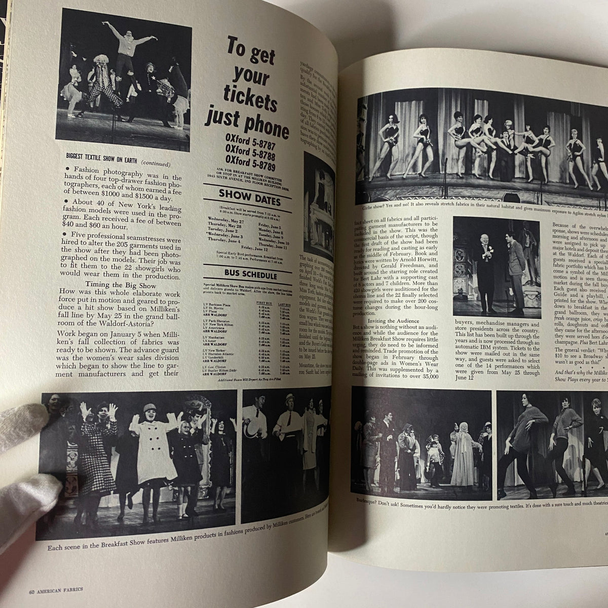 Inside spread of the 1964 American Fabrics No. 65 Fall Catalog featuring a promotional section for a major textile show with photographs of models showcasing various fabric designs and details about the event.