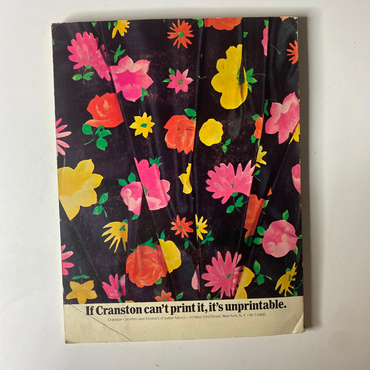1965 American Fabrics No. 68 Summer Catalog cover design displaying vibrant floral patterns on a dark background, emphasizing the creativity and quality of printed fabrics.