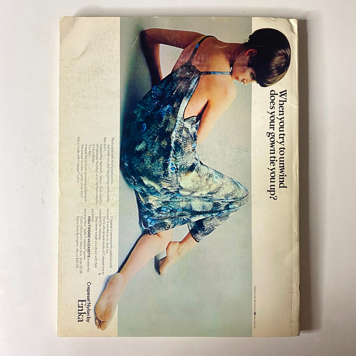 1966 American Fabrics No. 66 Summer Catalog back cover featuring a model in an elegant gown with an illustrative design promoting Enka fabric.