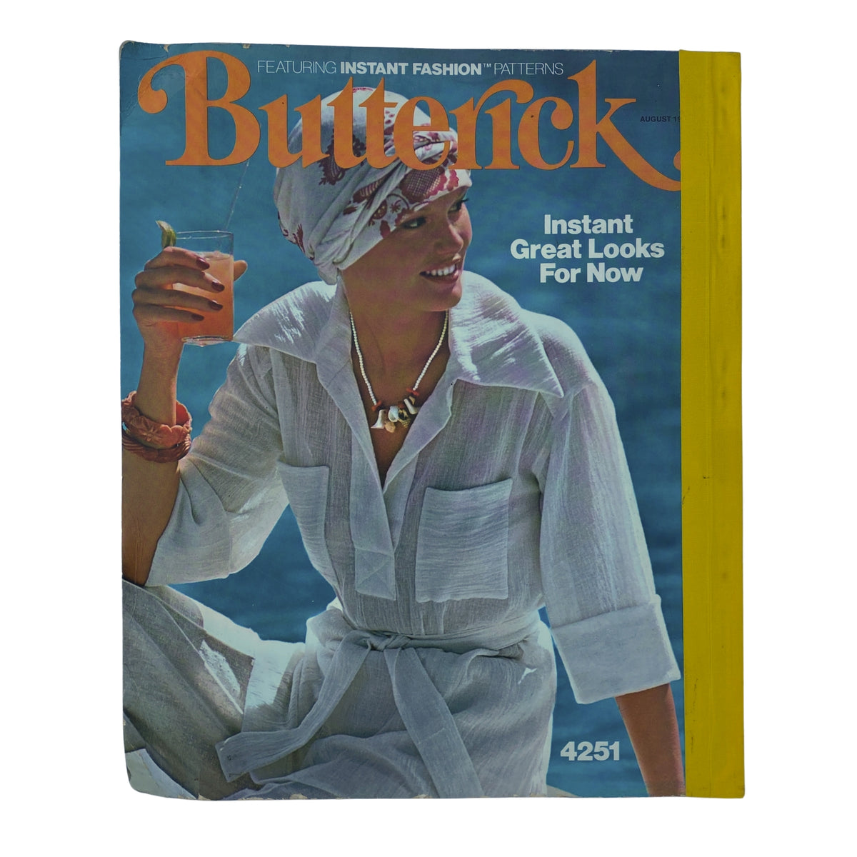 1975 August Butterick Catalog cover, presenting a woman in a stylish white outfit with a cocktail. The catalog promises instant fashion looks for summer, featuring design pattern number 4251.