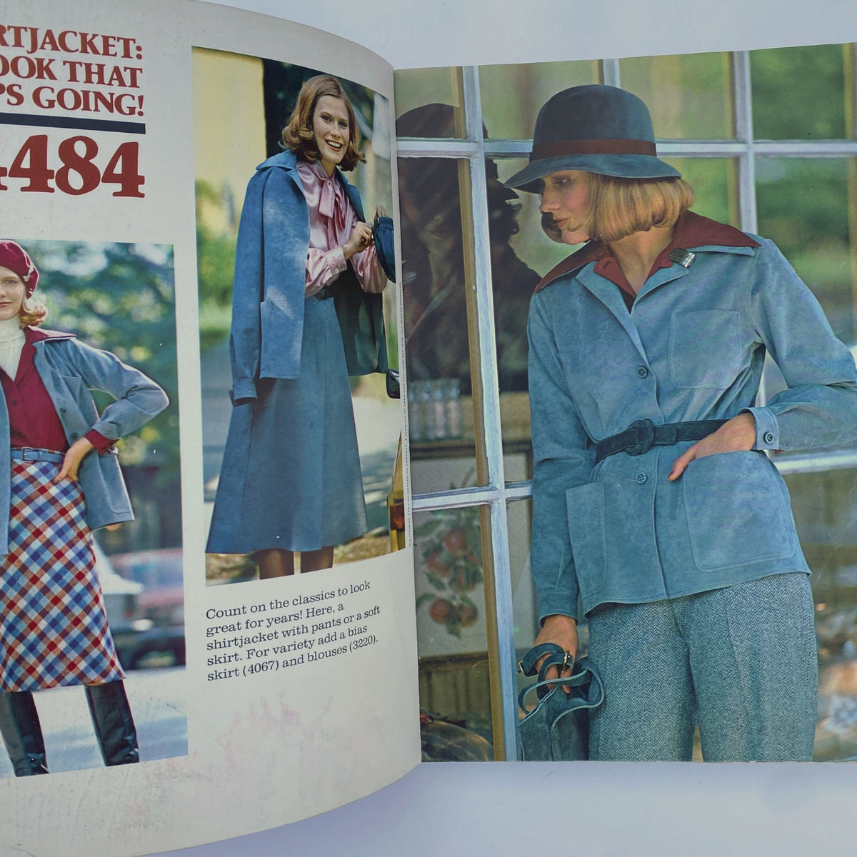 Interior page of the 1975 November Butterick Catalog featuring classic styles and layered fall fashion patterns, with two models displayed in coordinating outfits.