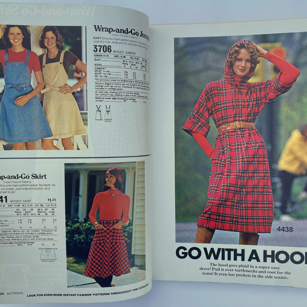 Fashion designs from the 1975 November Butterick Catalog featuring wrap-and-go patterns, showcasing models in vibrant outfits with plaid designs.