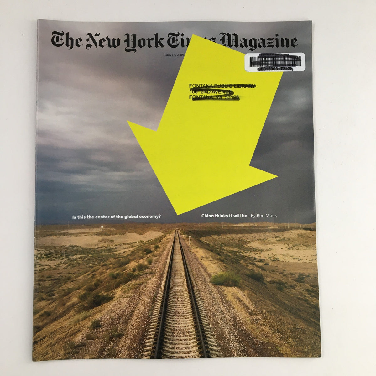 Cover of The New York Times Magazine from February 3, 2019, titled 'The Center of the Global Economy', featuring an image of a desolate landscape with railway tracks leading into the distance, discussing themes of global economic dynamics.