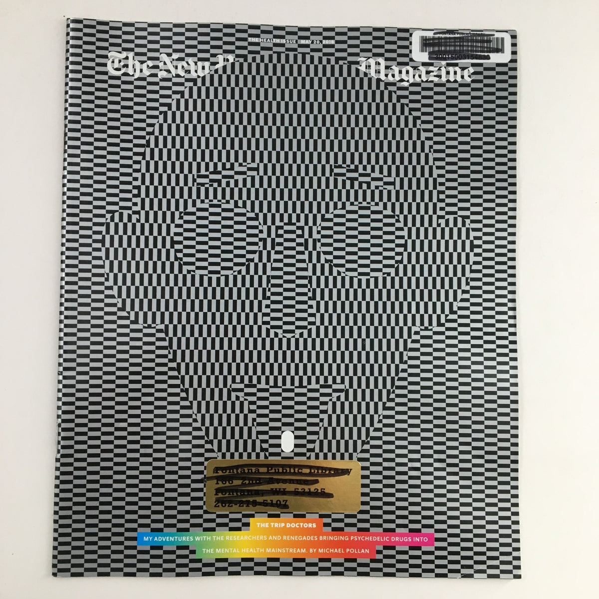 Cover of The New York Times Magazine, May 20, 2018, featuring the article 'The Trip Doctors' by Michael Pollan. The design includes a striking optical illusion of a face and includes library and barcode stickers for authenticity.