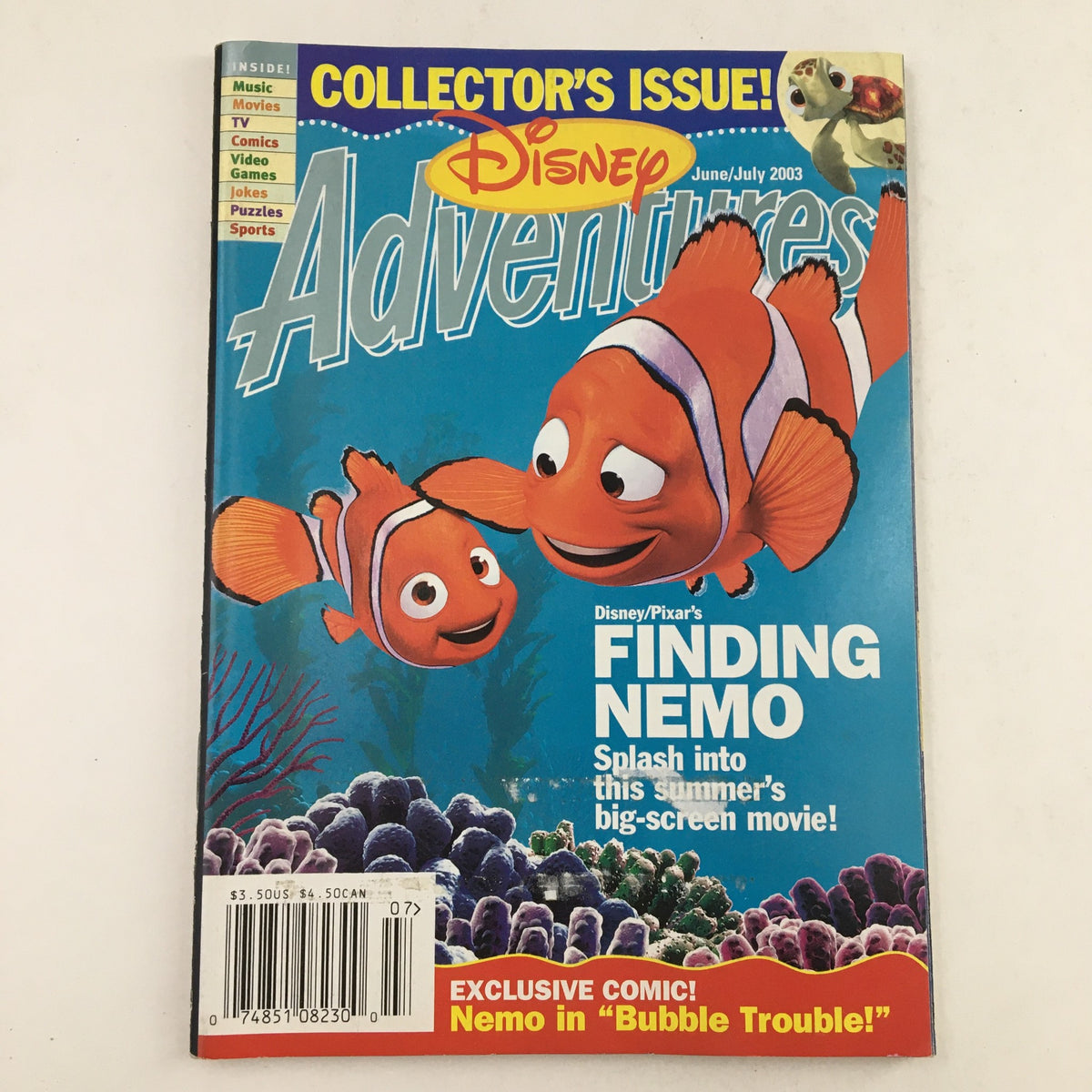 Cover of Disney Adventures Magazine June 2003 featuring Finding Nemo and Nemo in 'Bubble Trouble'. The magazine showcases vibrant artwork of clownfish characters with an ocean backdrop.