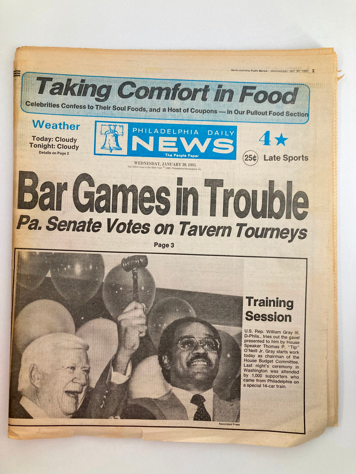Philadelphia Daily News Tabloid from January 30, 1985, featuring a headline about 'Bar Games in Trouble' and a photo of U.S. Rep. William Gray III and House Speaker Thomas O'Neill during a training session.