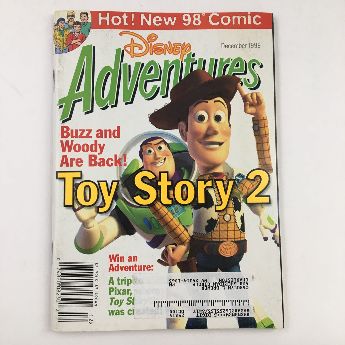 Cover of Disney Adventures Magazine December 1999 featuring Buzz Lightyear and Sheriff Woody from Toy Story 2. The magazine highlights the excitement of the late 90s animated film era.
