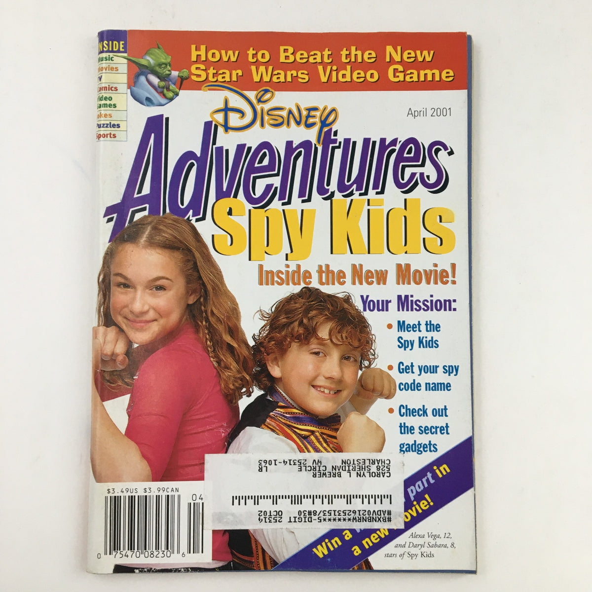 Disney Adventures Magazine April 2001 featuring Spy Kids, Alexa PenaVega and Daryl Sabara on the cover. Highlights include adventure-themed content and collectibles from the early 2000s.