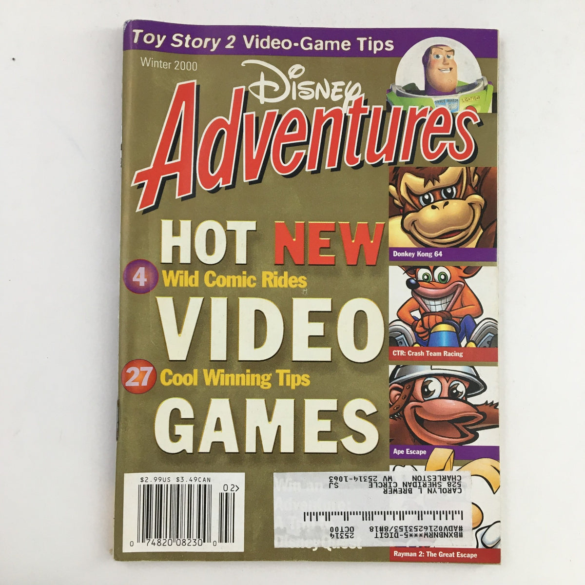 Cover of Disney Adventures Magazine Winter 2000 featuring Donkey Kong 64 and Crash Team Racing, highlighting 'Hot New Video Games' and 'Wild Comic Rides'.