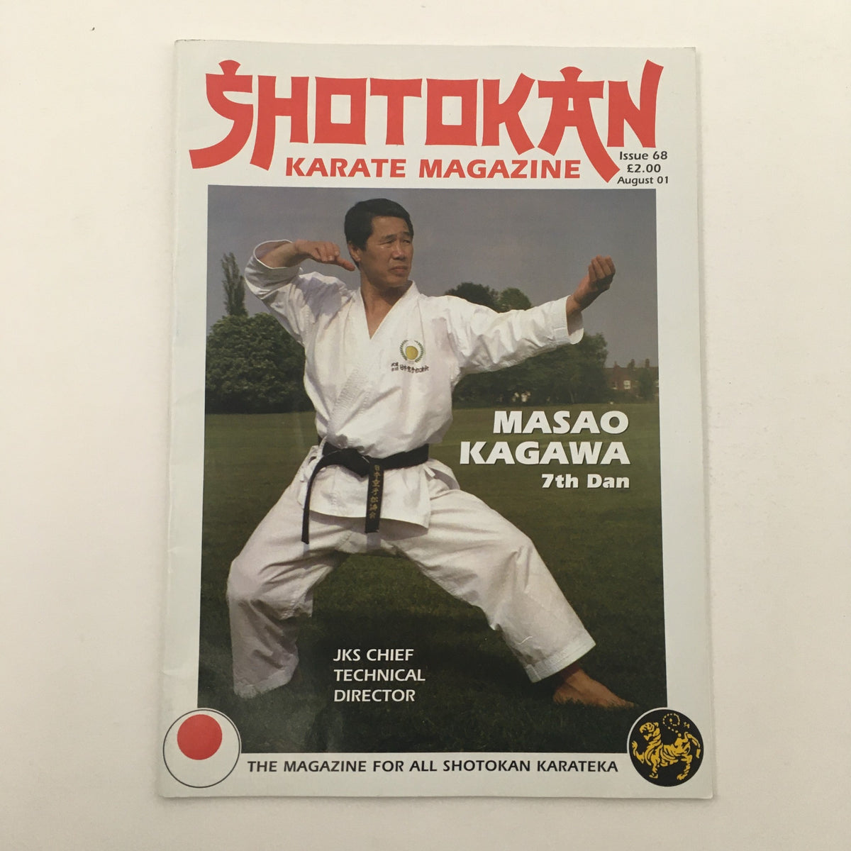 Cover of Shotokan Karate Magazine August 2001 Issue #68 featuring Sensei Masao Kagawa, 7th Dan, showcasing karate skills and traditional attire.