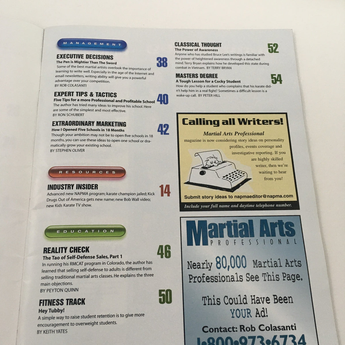 Interior page layout of Martial Arts Professional Magazine May 2003, showcasing various sections including management, education, and resources.