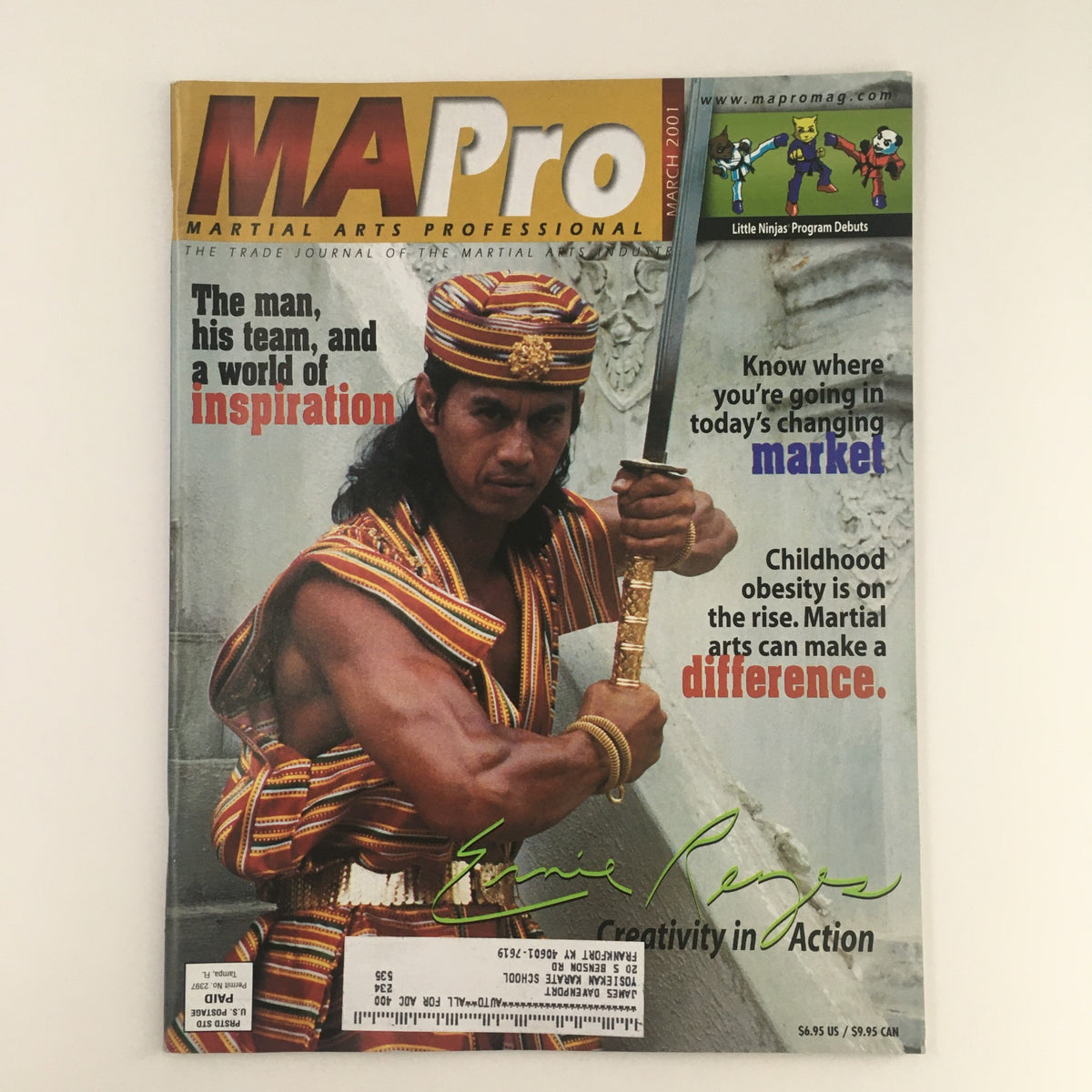 Martial Arts Pro Magazine March 2001 featuring Ernie Reyes on the cover, showcasing his powerful pose and traditional attire, highlighting the theme of creativity in action.