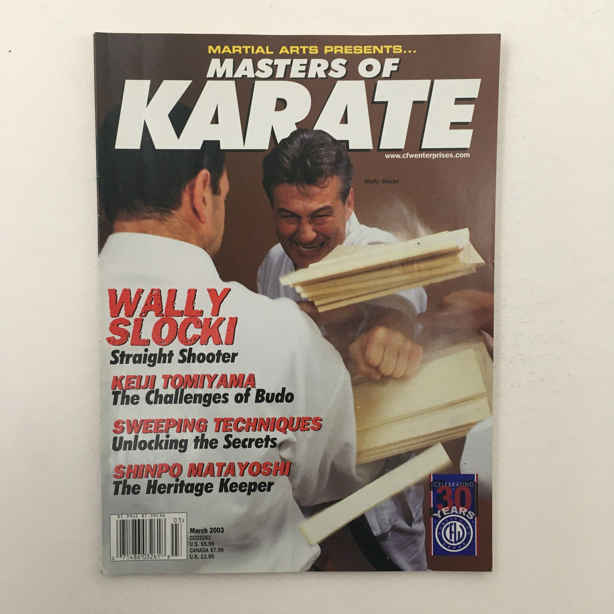 Cover of Masters of Karate March 2003 magazine featuring expert Wally Slocki, showcasing martial arts techniques and articles.