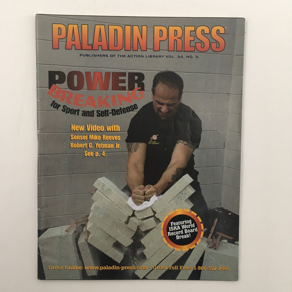 Paladin Press Magazine Vol 34 #5 cover featuring Sensei Mike Reeves demonstrating Power Breaking techniques, including a video announcement for self-defense.
