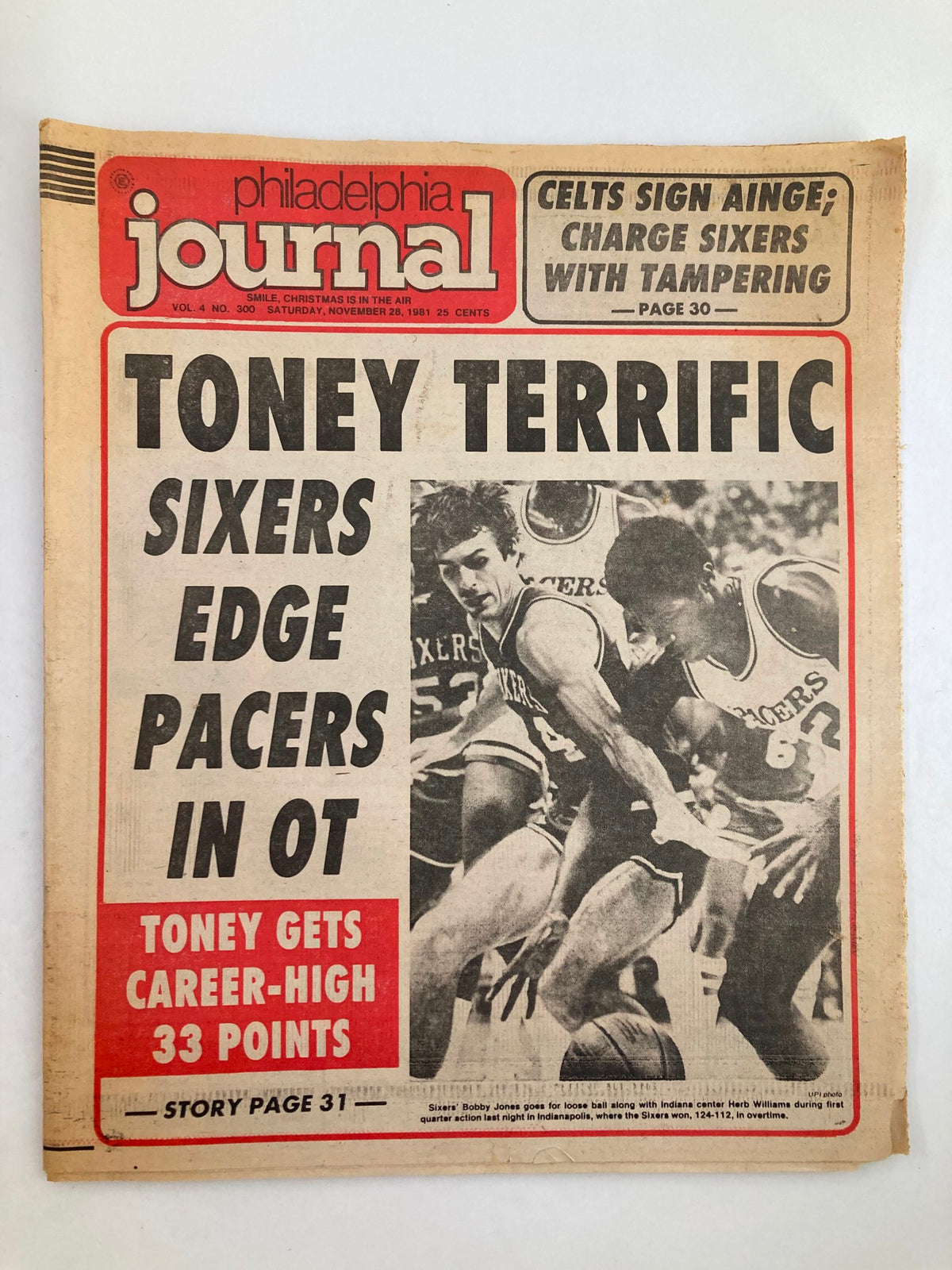 Philadelphia Journal Tabloid from November 28, 1981, featuring NBA Sixers' Bobby Jones on the front cover with the headline 'Toney Terrific: Sixers Edge Pacers in OT' and a photo of Jones in action.