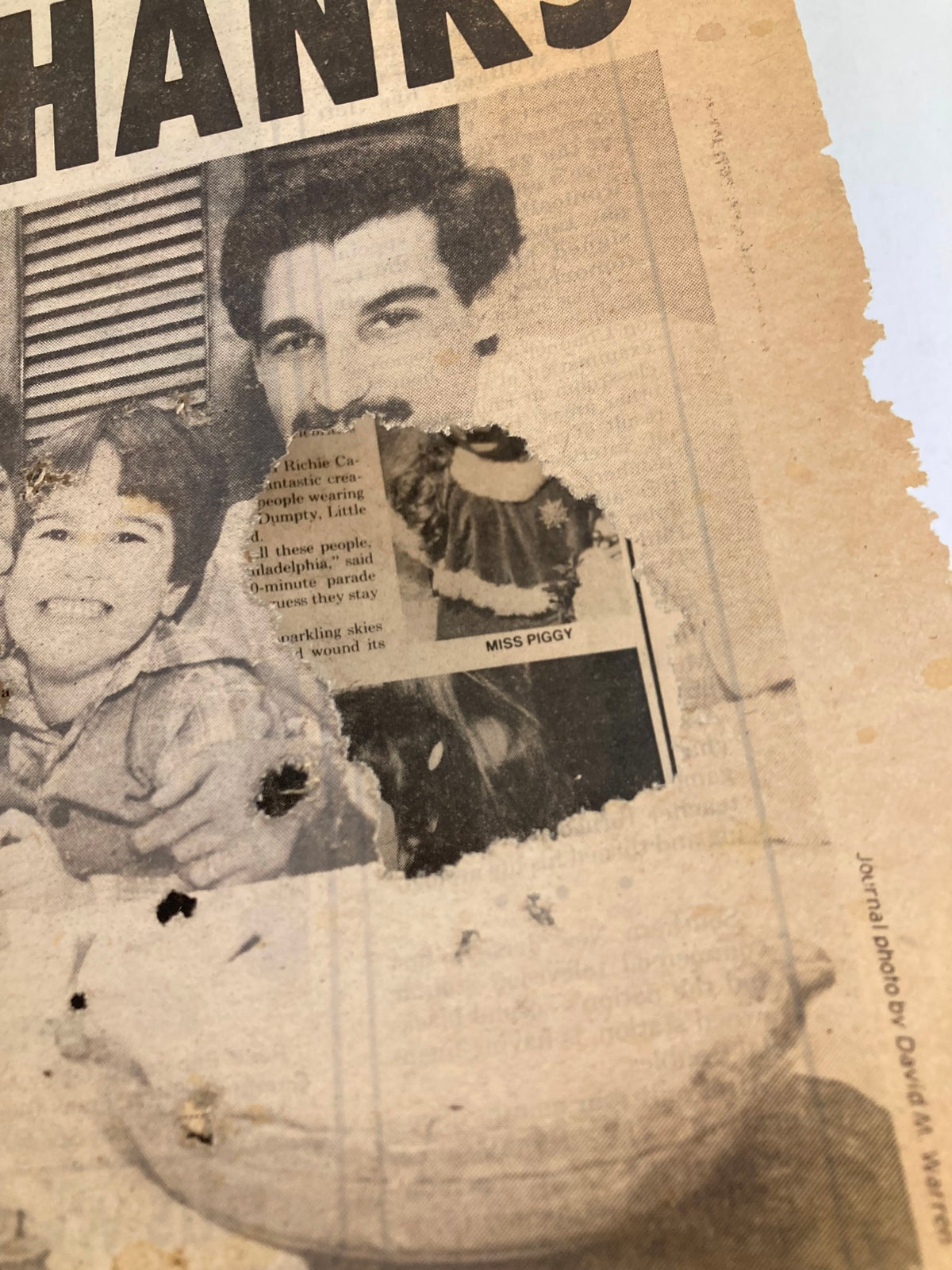 Partial view of the Philadelphia Journal Tabloid from November 27, 1981, focusing on Thanksgiving content, showing details of a family enjoying holiday festivities and an advertisement for a contest.