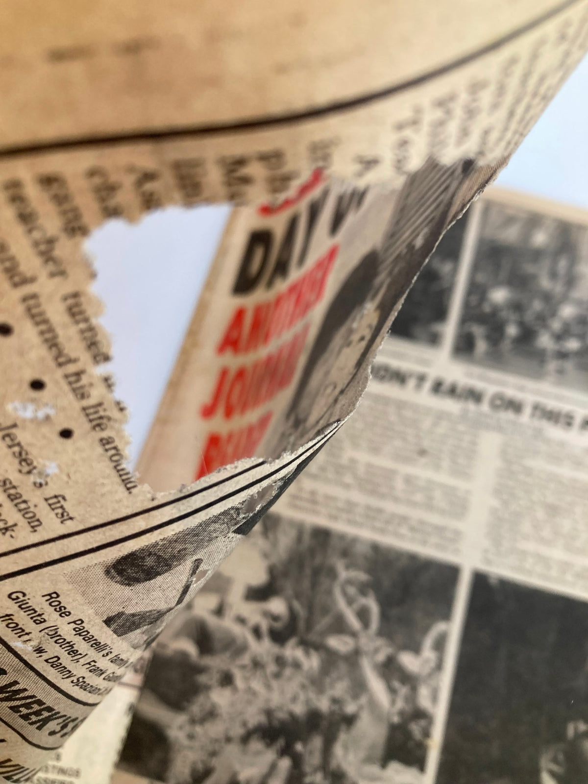 Side view of the Philadelphia Journal Tabloid from November 27, 1981, capturing the worn edges and texture of the vintage newspaper, depicting its historical significance in NHL and Thanksgiving culture.