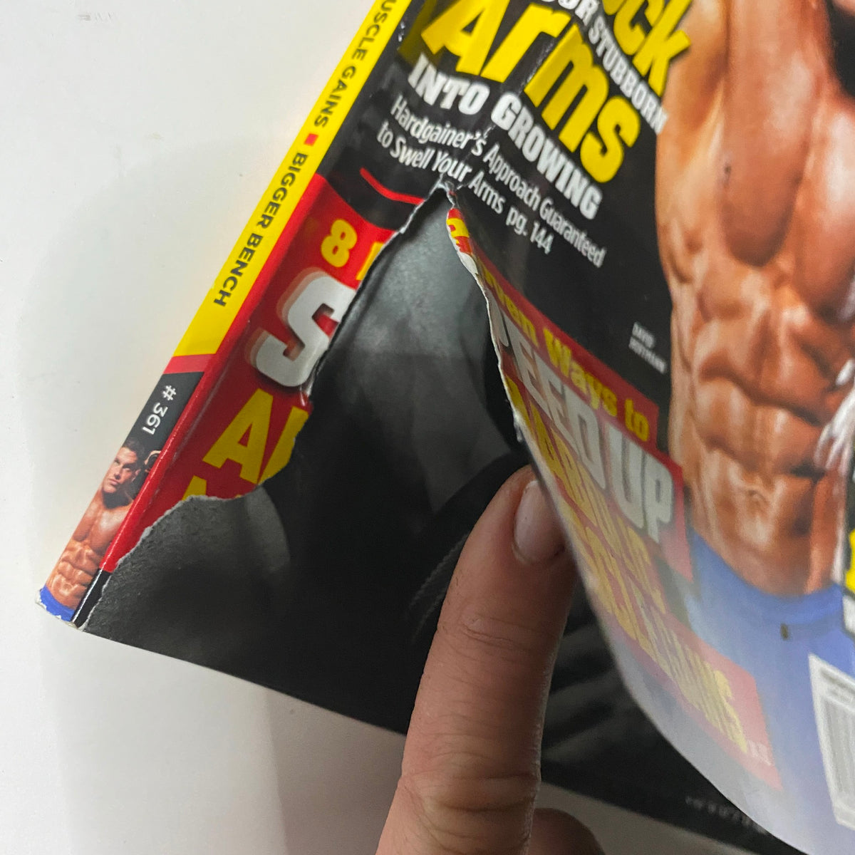 Interior detail of MuscleMag Magazine June 2012 No. 361 highlighting the wear and uniqueness of the vintage publication.