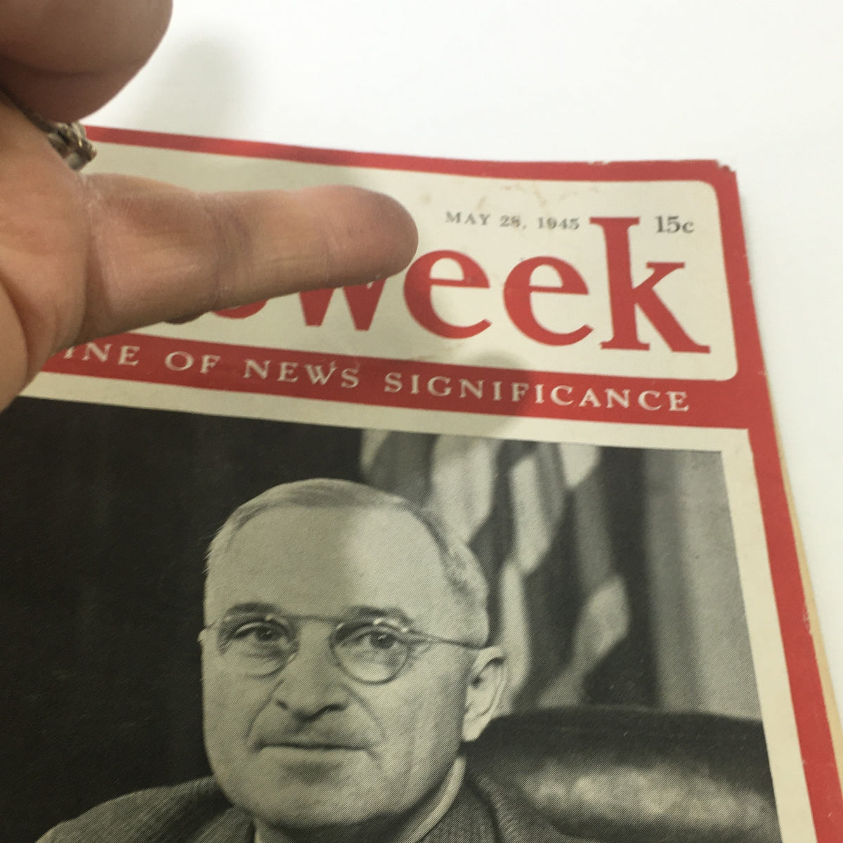Front cover of the vintage Newsweek magazine from May 28, 1945, featuring U.S. President Harry S. Truman with a hand pointing at the magazine title.