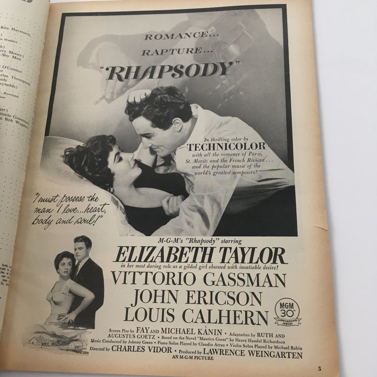 Interior page from VTG Movieland May 1954 magazine featuring Elizabeth Taylor in the film 'Rhapsody'. The page highlights romantic scenes, promoting the film with a classic Technicolor ad.