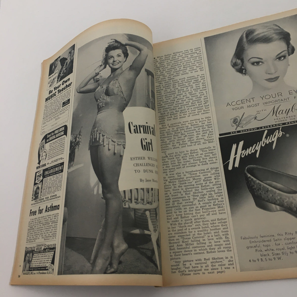 Inside page of VTG Movieland September 1951 magazine featuring an article about Esther Williams, titled 'Carnival Girl', along with advertisements.