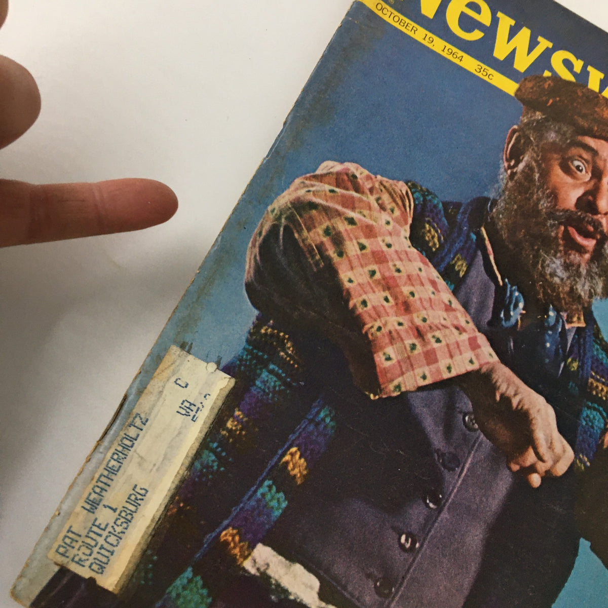 Close-up view of the cover of VTG Newsweek Magazine October 19, 1964, highlighting Zero Mostel, Broadway's Brightest Star, with visible age-related wear and a label.