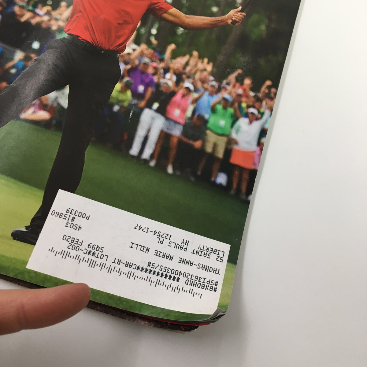 Close-up of the barcode label on the cover of Sports Illustrated Magazine April 22-29 2019 featuring Tiger Woods.