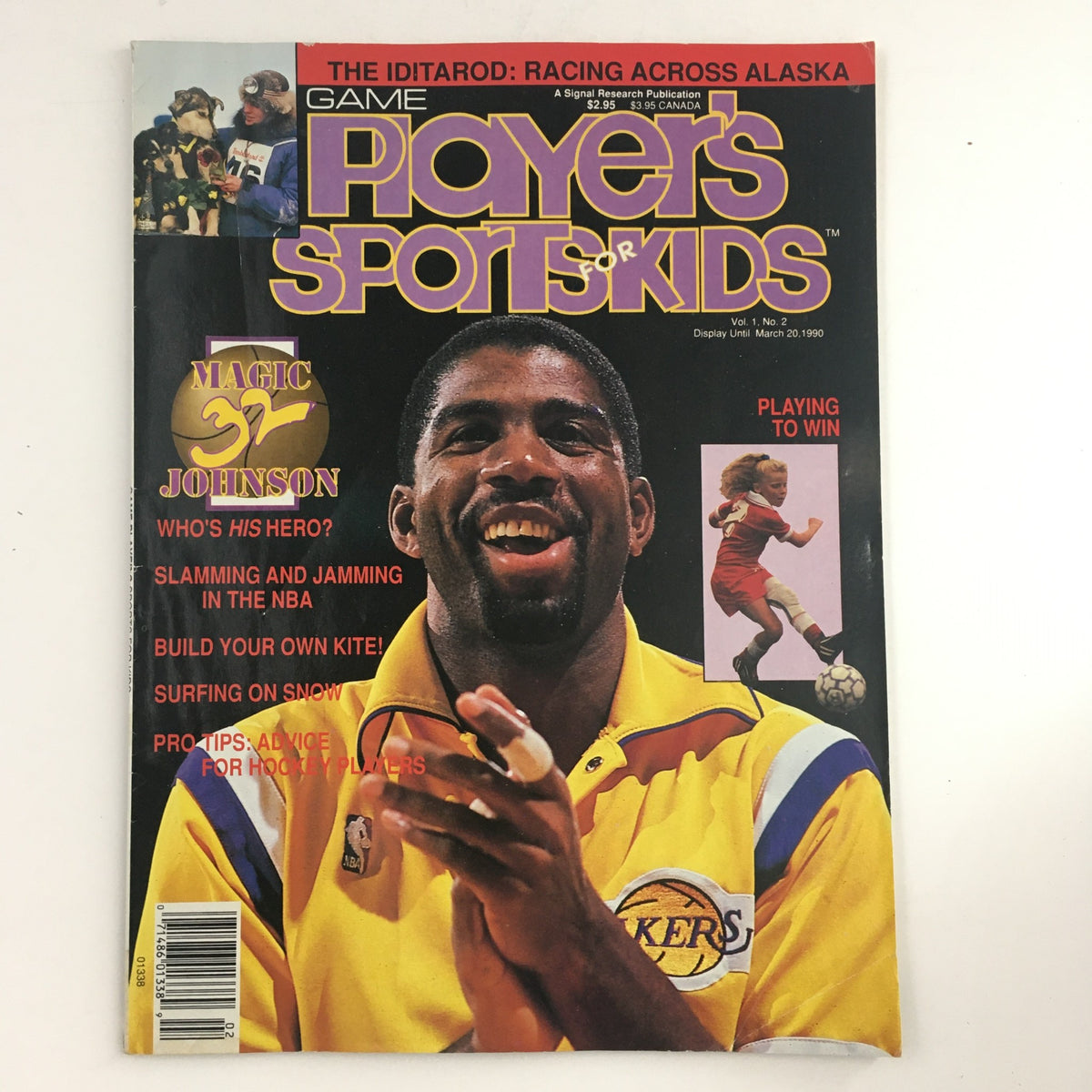 Cover of the Game Player's Sports for Kids Magazine from 1990 featuring Earvin 'Magic' Johnson, highlighting basketball culture with vibrant colors and engaging sports articles aimed at young readers. This edition showcases the excitement of youth sports alongside images of kids actively playing.