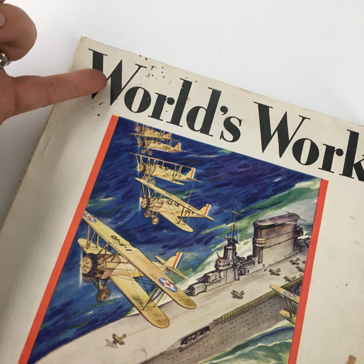 Close-up of the top left corner of VTG World's Work Magazine December 1929 cover, highlighting the title 'World's Work' and minor wear.