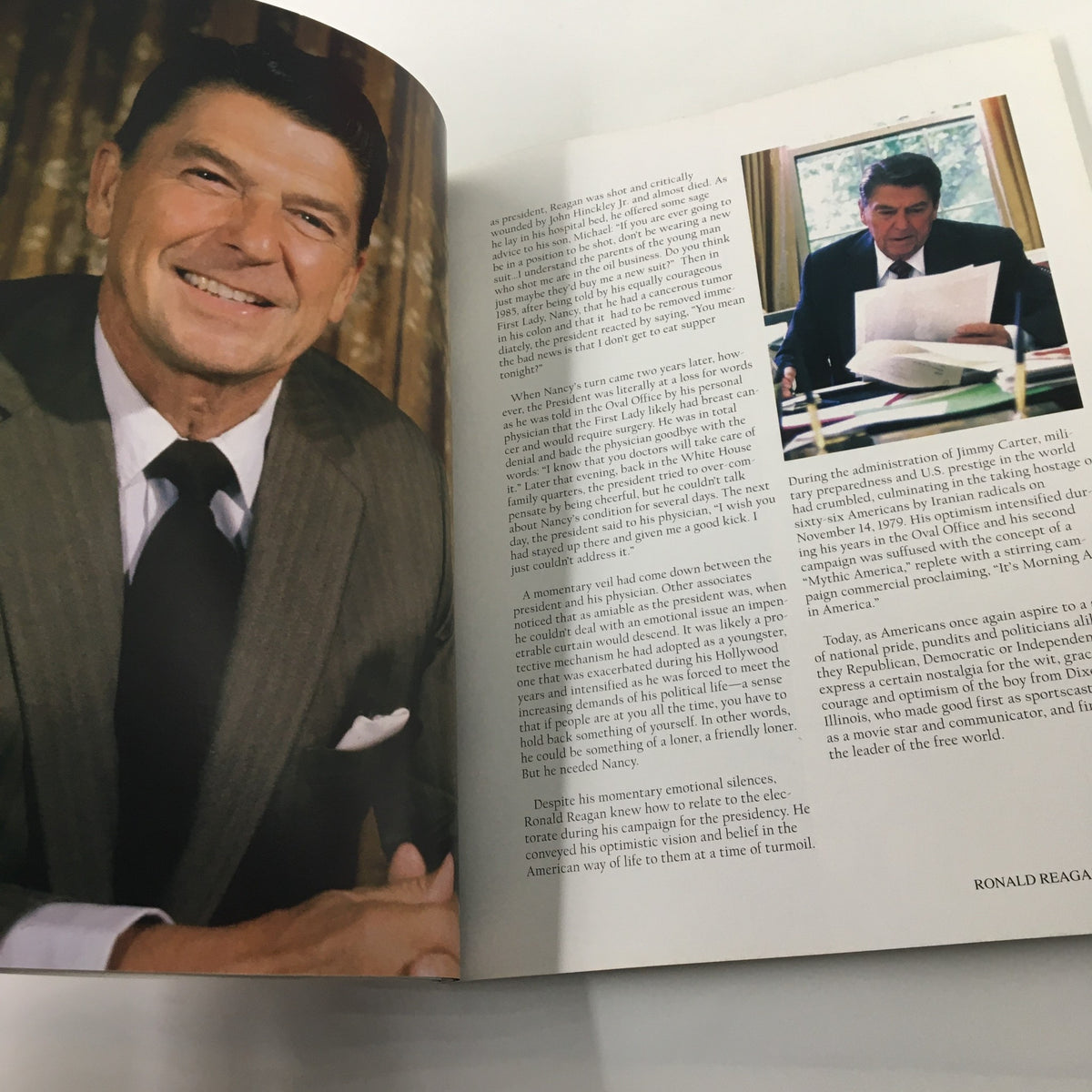 Interior page from 'A Tribute To Reagan 1911 - 2004', showcasing Ronald Reagan in a formal setting, highlighting his leadership.