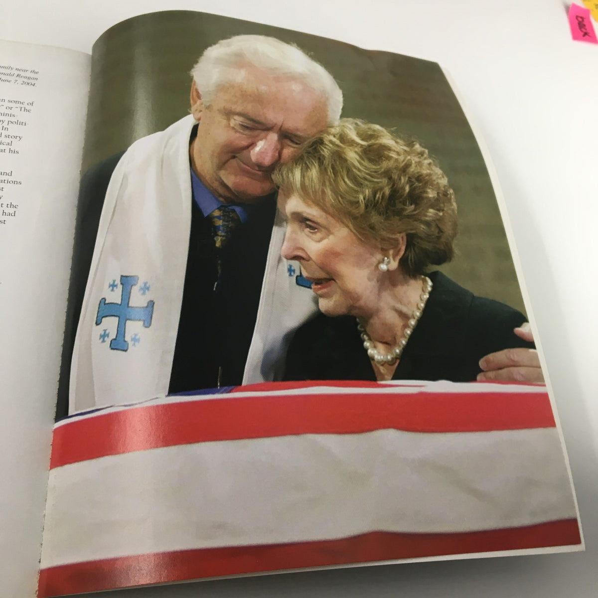 A Tribute To Reagan 1911 - 2004 showing an emotional moment between friends and family at Ronald Reagan's funeral, capturing the personal loss felt by loved ones.
