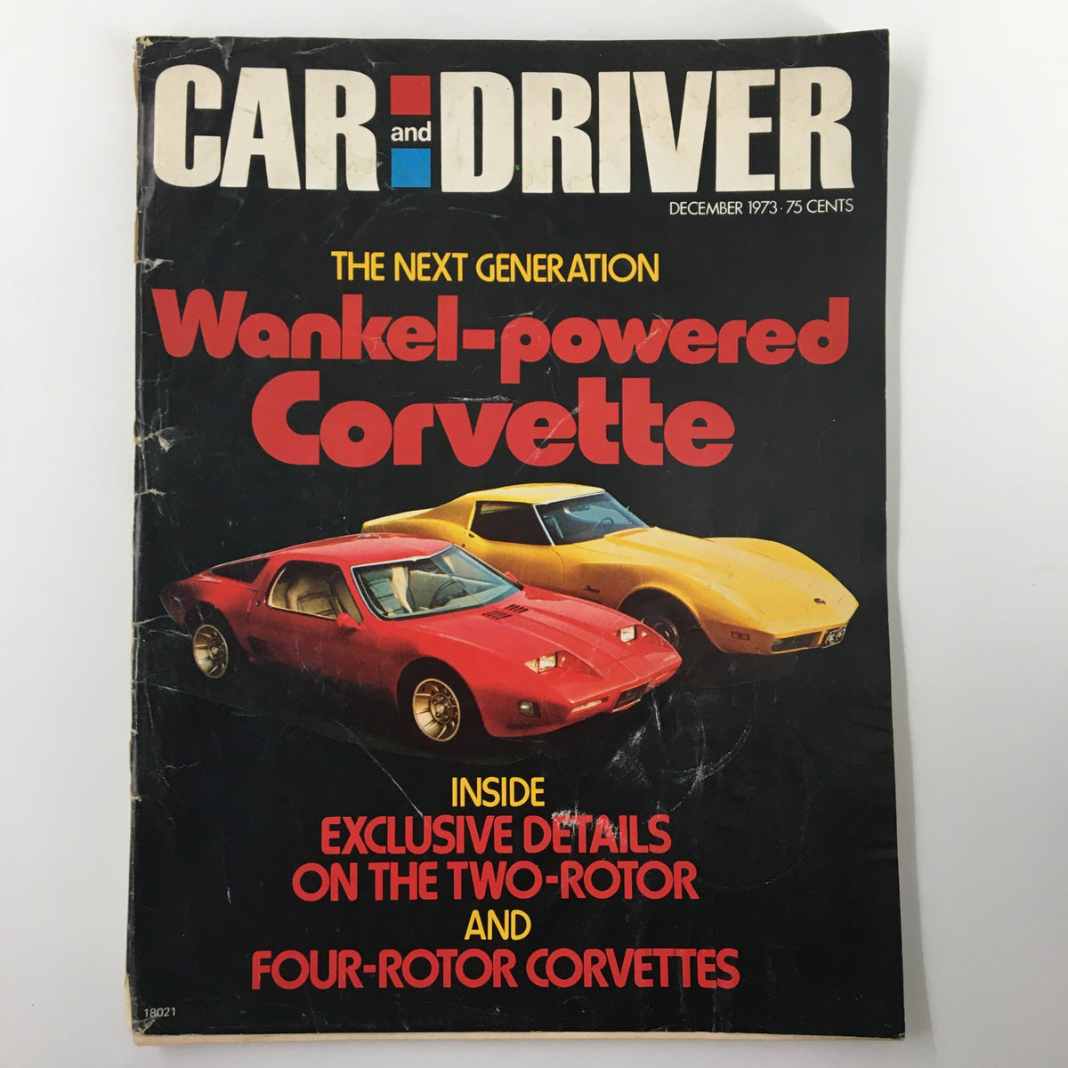 VTG Car and Driver December 1973 Wankel-Powered Corvette magazine cover featuring the iconic red and yellow Corvettes, showcasing the headline about the next generation of Wankel-powered Corvettes.