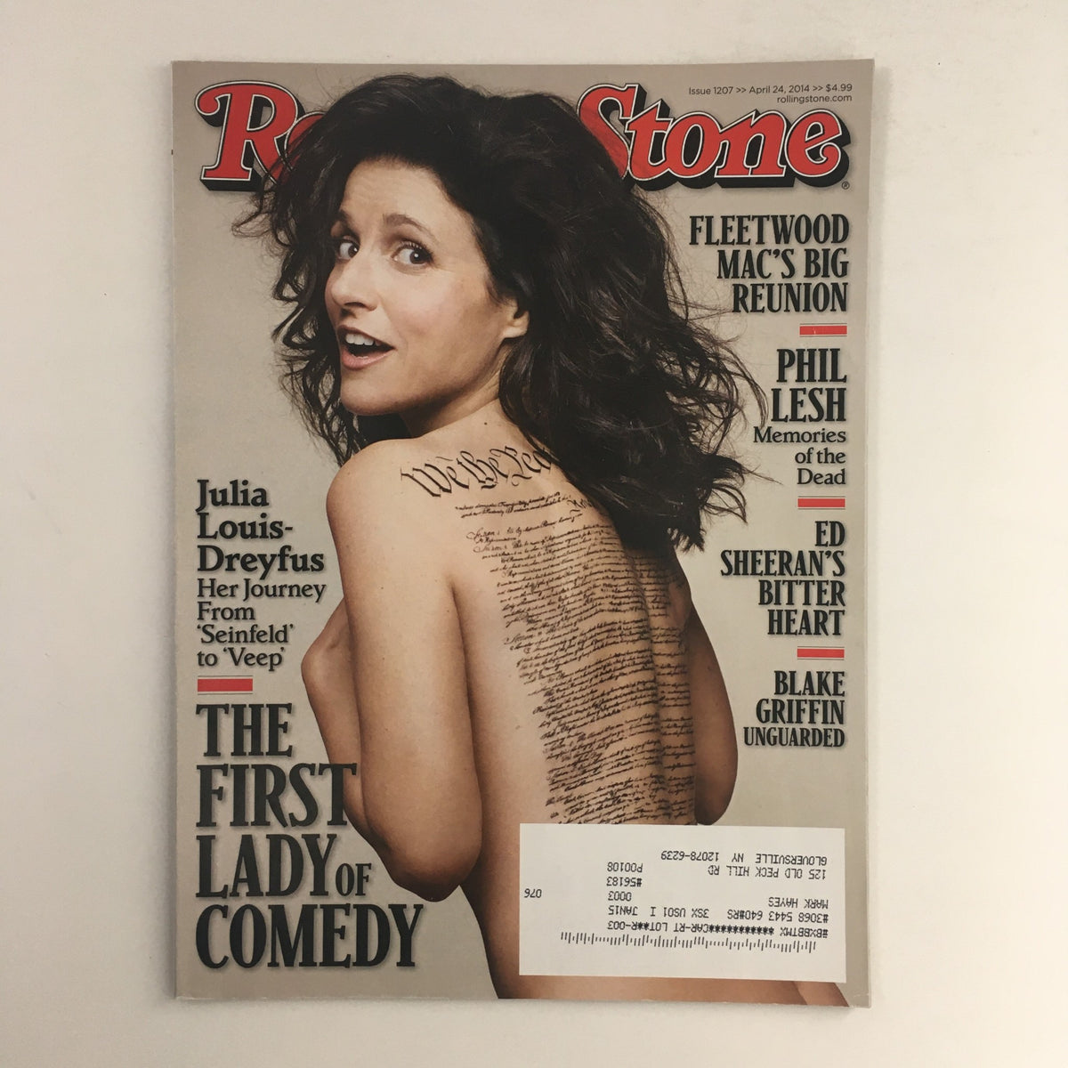 Rolling Stone Magazine featuring Julia Louis-Dreyfus on the cover, titled 'The First Lady of Comedy', April 24, 2014. Highlights include her rise in comedy and insights on Ed Sheeran, presented in very good condition with a protective covering.