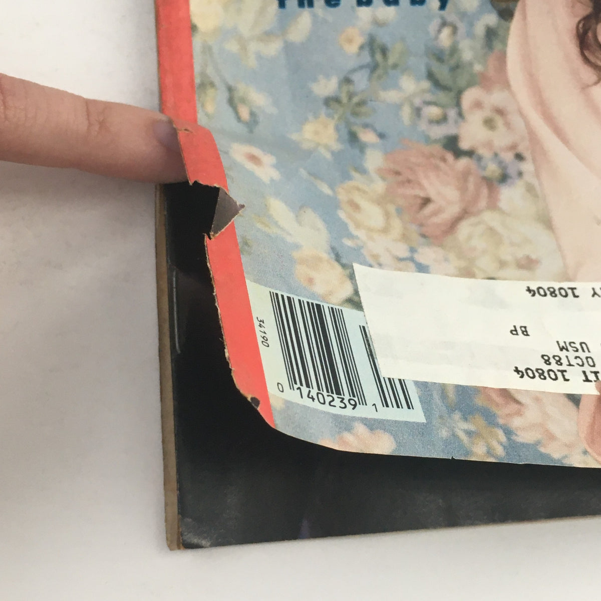 Close-up view of the corner and edge of US Magazine Vol 3 #76 May 16 1988 featuring Demi Moore Discussing Bruce Willis and Their Baby, showing wear and an address label.