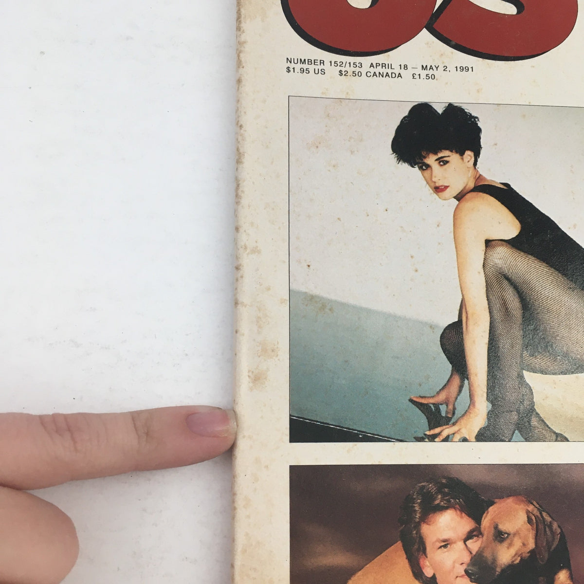 Cover image of 'US Magazine #152 April 18 1991' showcasing a female model in stylish attire alongside a photo of a famous male actor with a dog.