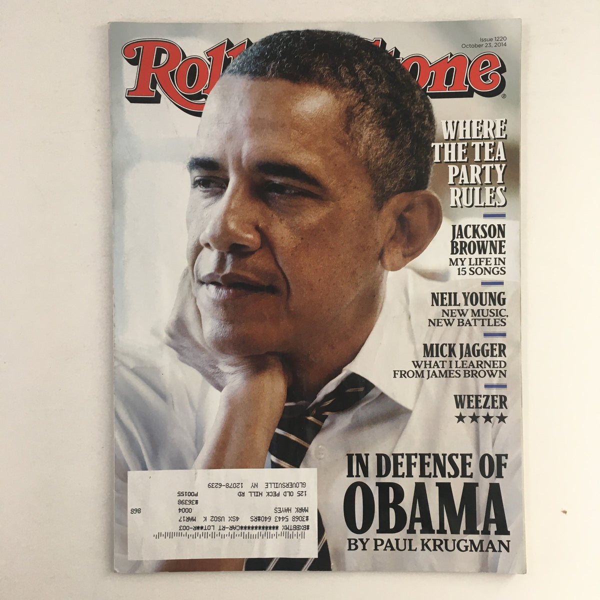 Rolling Stone Magazine October 23, 2014 featuring Barack Obama on the cover, along with notable articles on Jackson Browne and Neil Young, reflecting on music and politics.