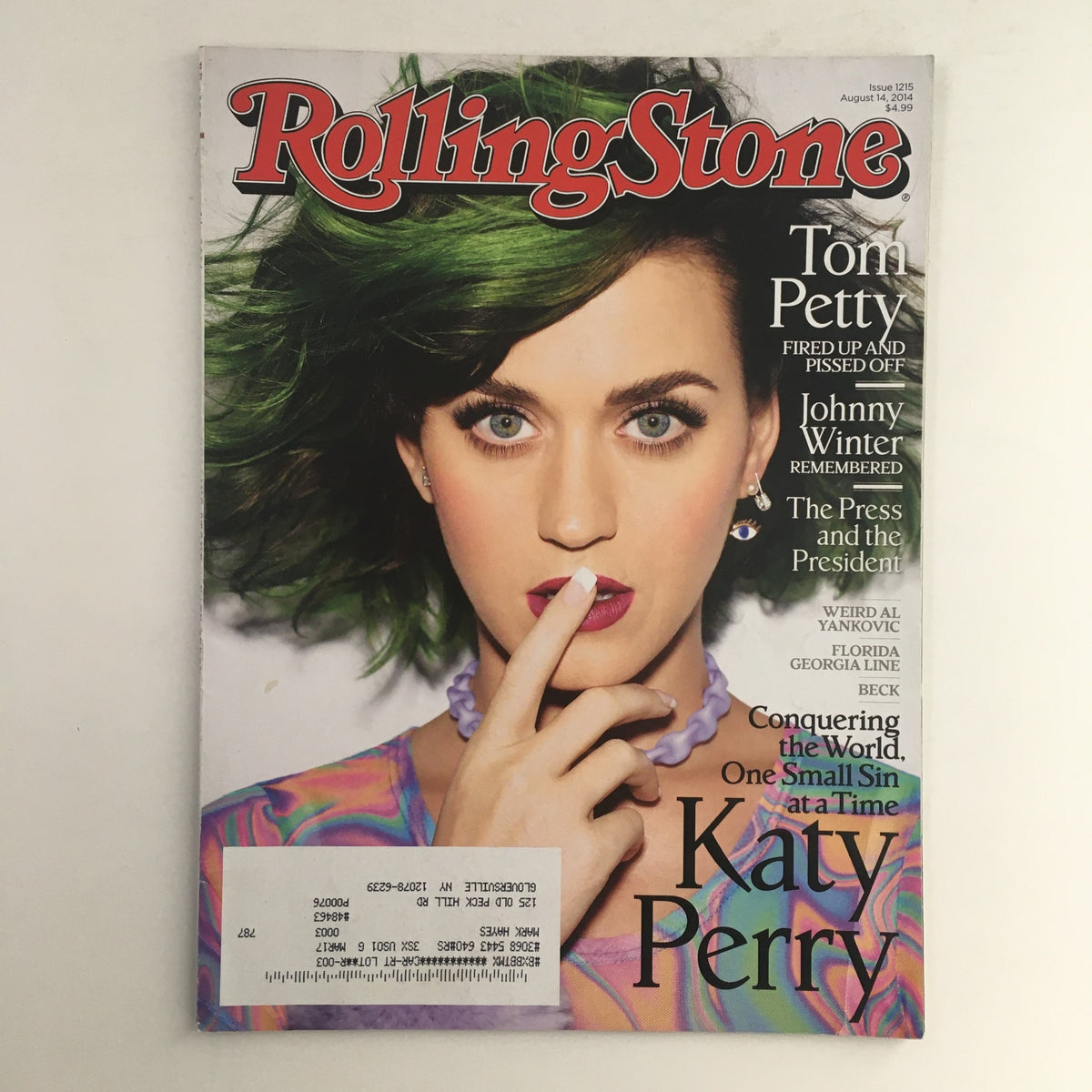 Rolling Stone Magazine cover for August 14, 2014 featuring Katy Perry, Tom Petty, and Johnny Winter, showcasing vibrant imagery and cultural insights from the music industry.